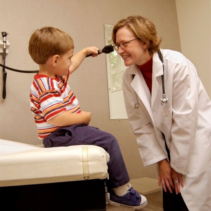toddler and pediatrician during appointment